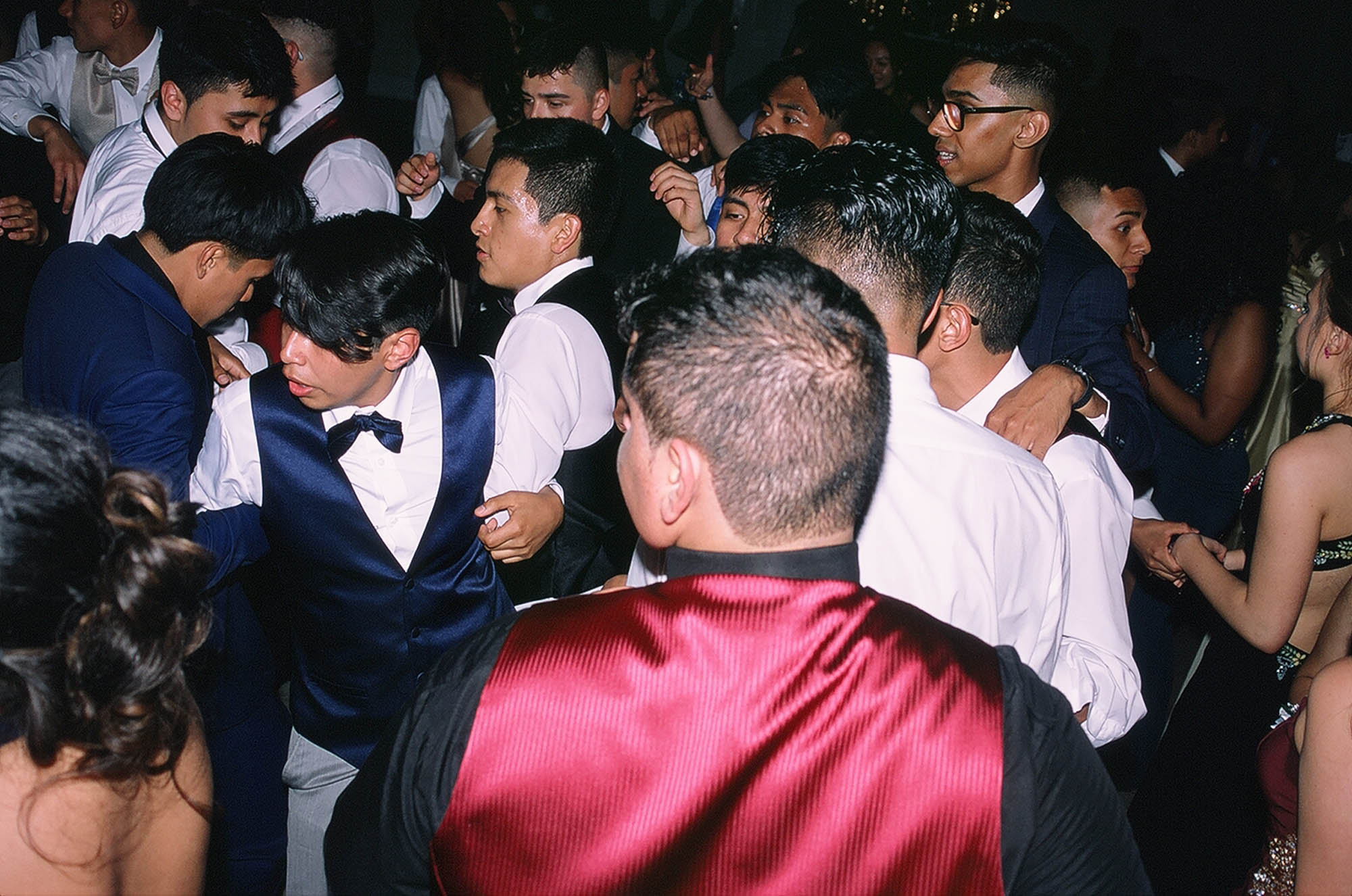 My senior prom pictures while people dancing Date: May 31, 2019 Shot on Fujifilm Fujichrome Provia 100f