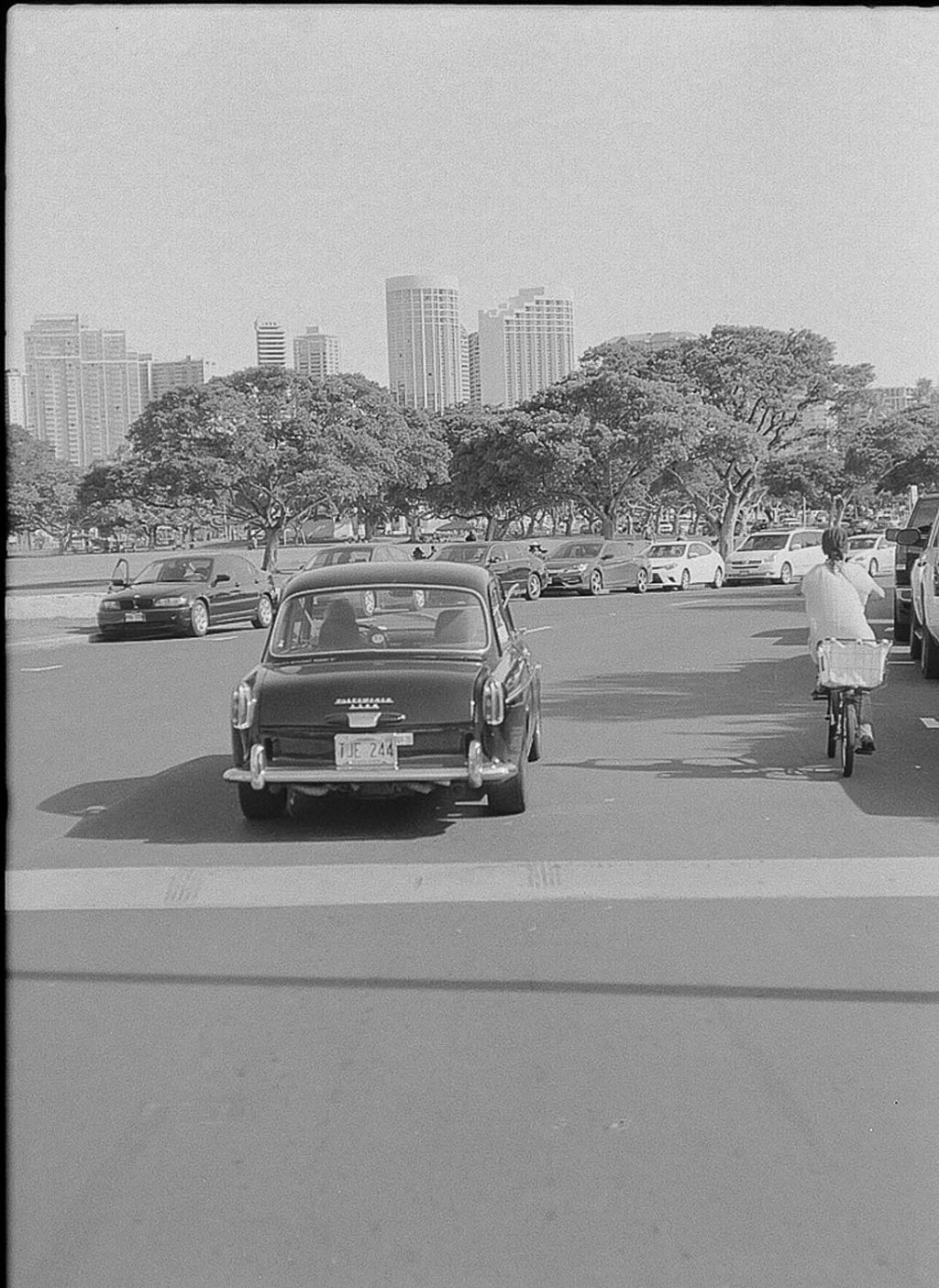 The hardest shot I've ever taken. I had to chase this car down on my skateboard to get this shot. This is Honolulu, Hawaii near the beach walk.